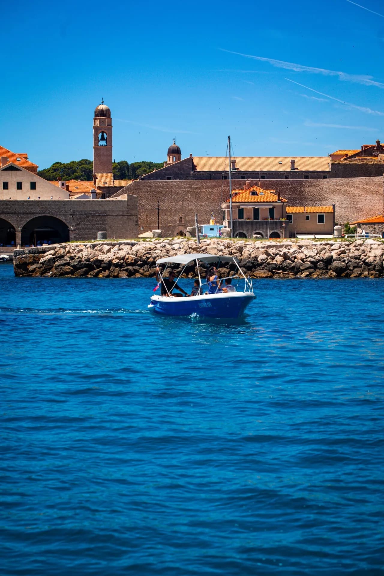 Private boat exploring caves and coastline near Dubrovnik